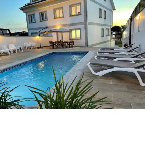 Vivienda adosada con piscina cerca de la playa