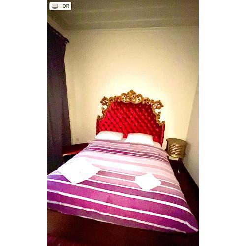 Xenia Purple Suit Otel