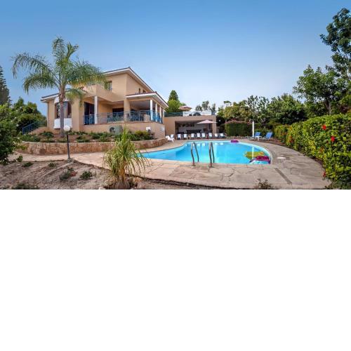 Zeus Sublime Villa 5 bedrms HEATED POOL by Coral Sun Villas,